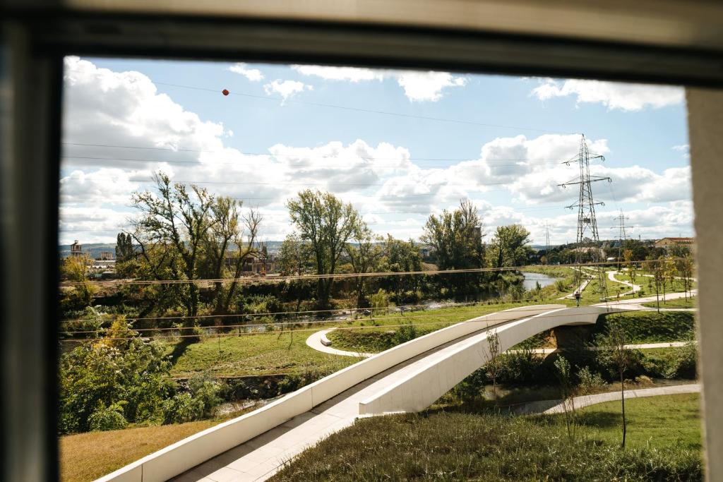 The Someș river and riverside park seen from a Riverside window